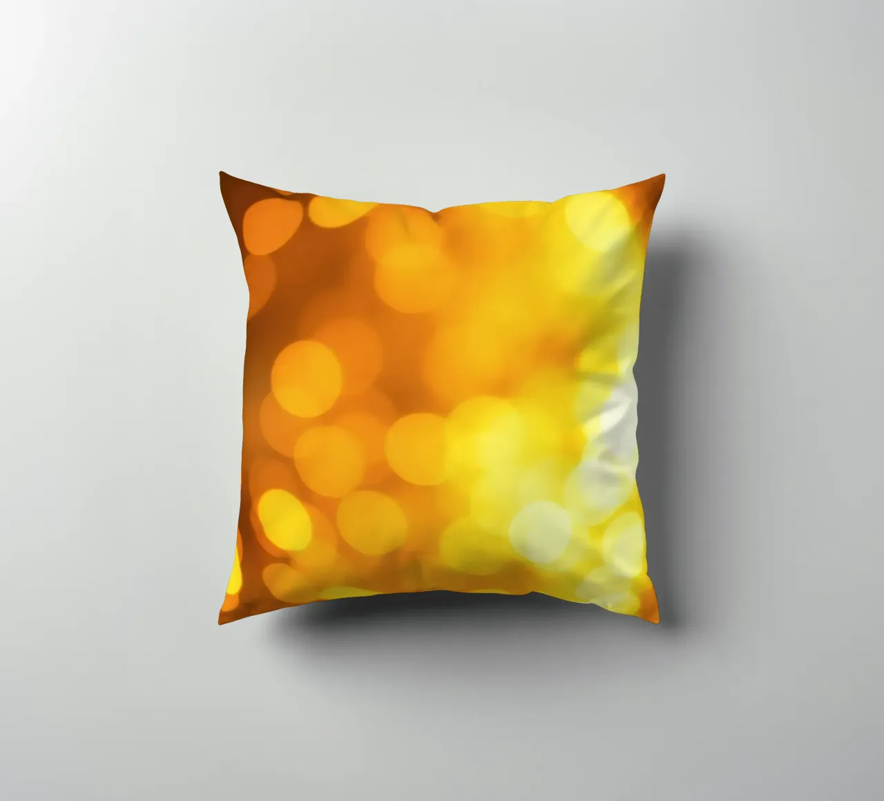 golden bokeh background design featuring abstract shimmerin decorative cushion by DesignDoodle