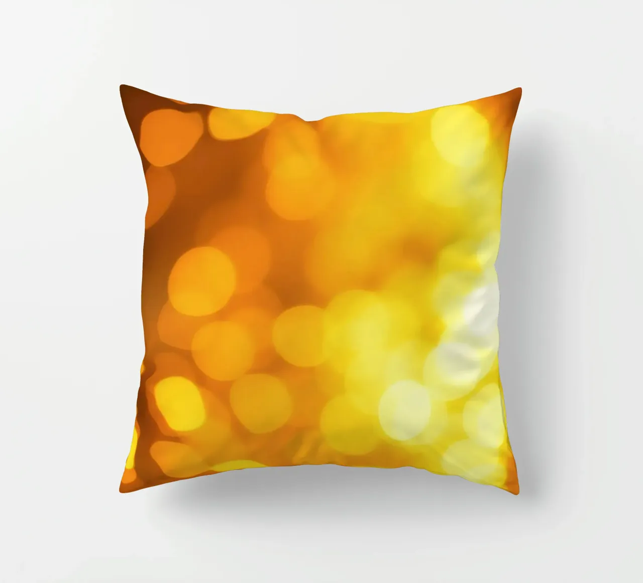 golden bokeh background design featuring abstract shimmerin decorative cushion by DesignDoodle