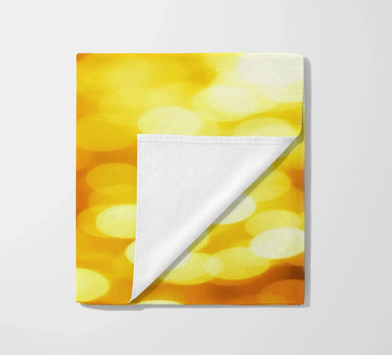 golden bokeh background design featuring abstract shimmerin beach towel by DesignDoodle