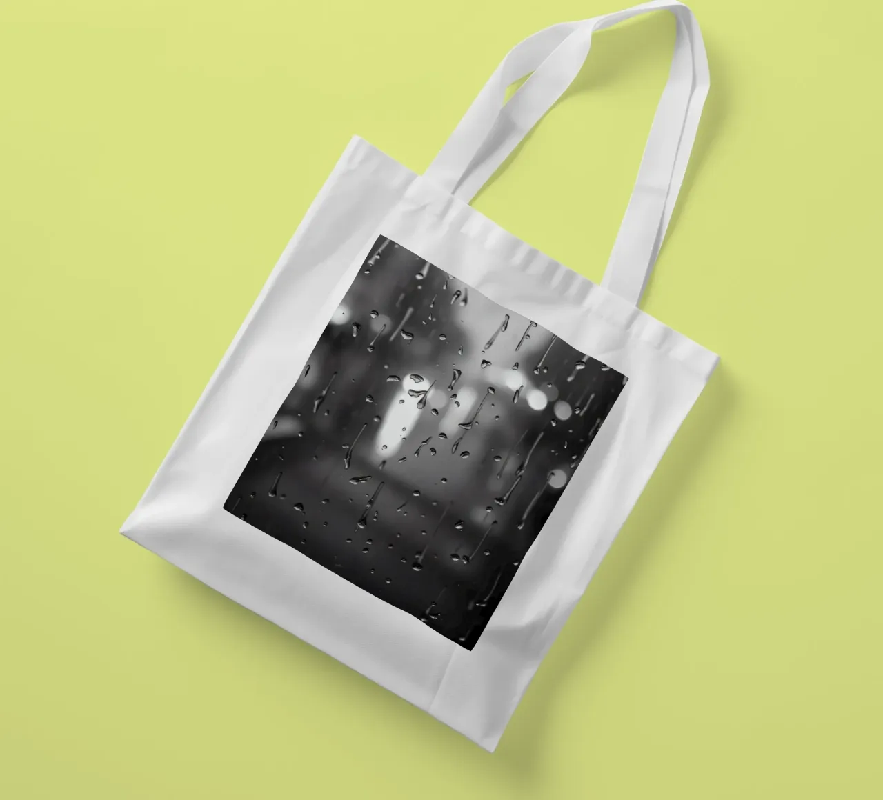 Raindrops on window creating a calming effect tote bag by DesignDoodle