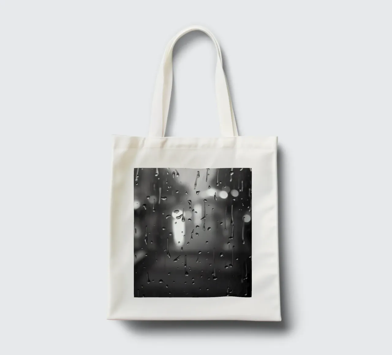 Raindrops on window creating a calming effect tote bag by DesignDoodle