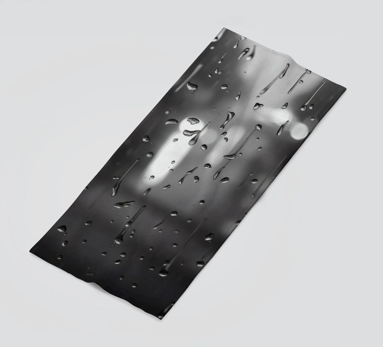 Raindrops on window creating a calming effect beach towel by DesignDoodle