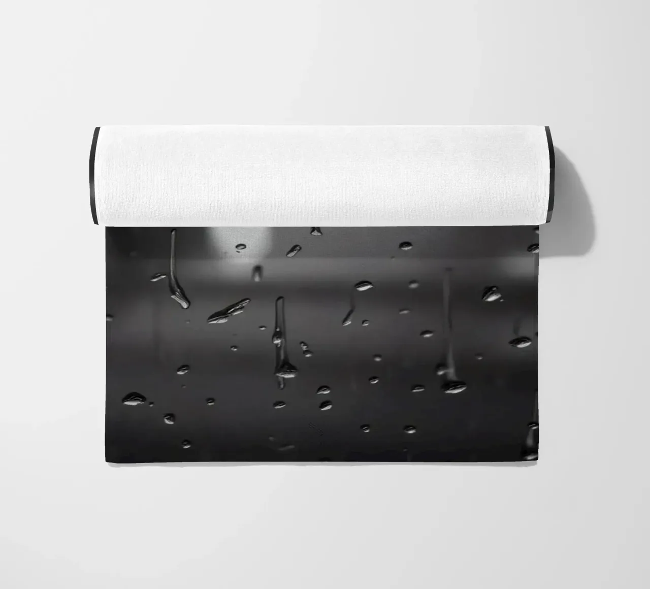 Raindrops on window creating a calming effect beach towel by DesignDoodle