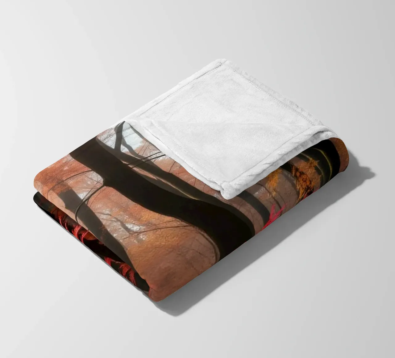 Captivating forest path adorned with vibrant autumn leaves fleece blanket by DesignDoodle