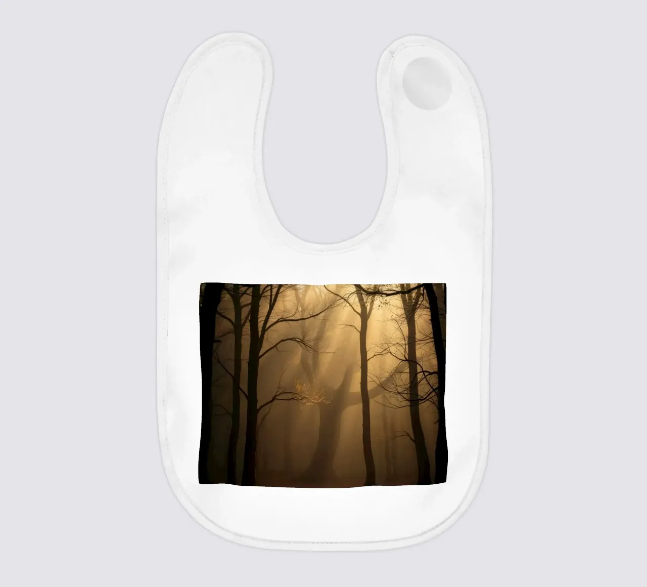 forest with sunlight filtering through trees baby bib by DesignDoodle