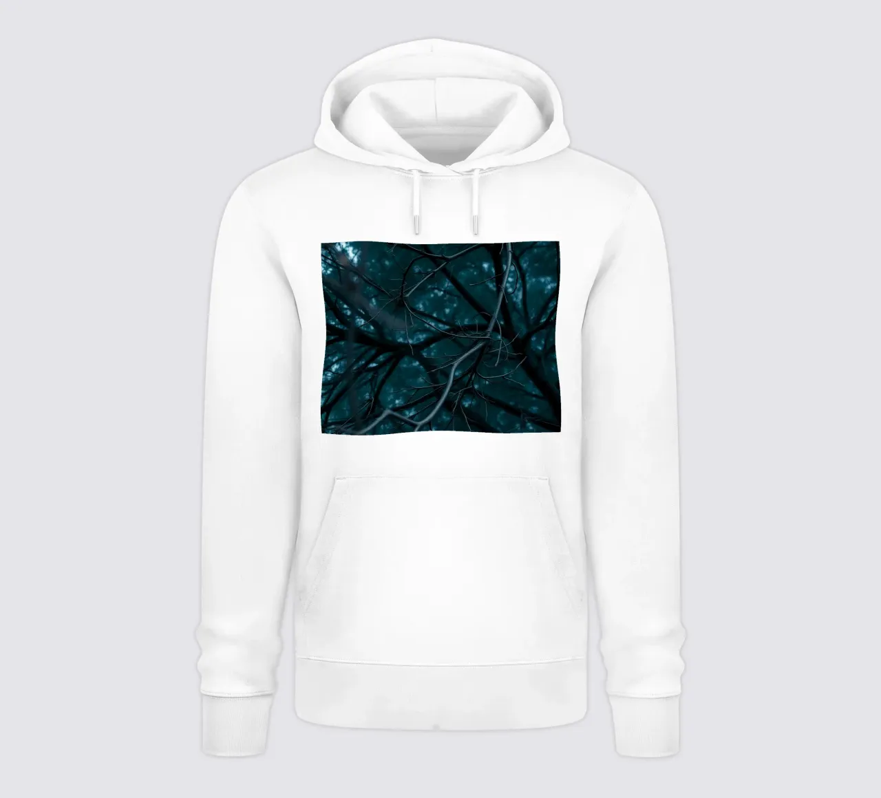 Branches intertwine against a dark, moody backdrop hoodie by DesignDoodle