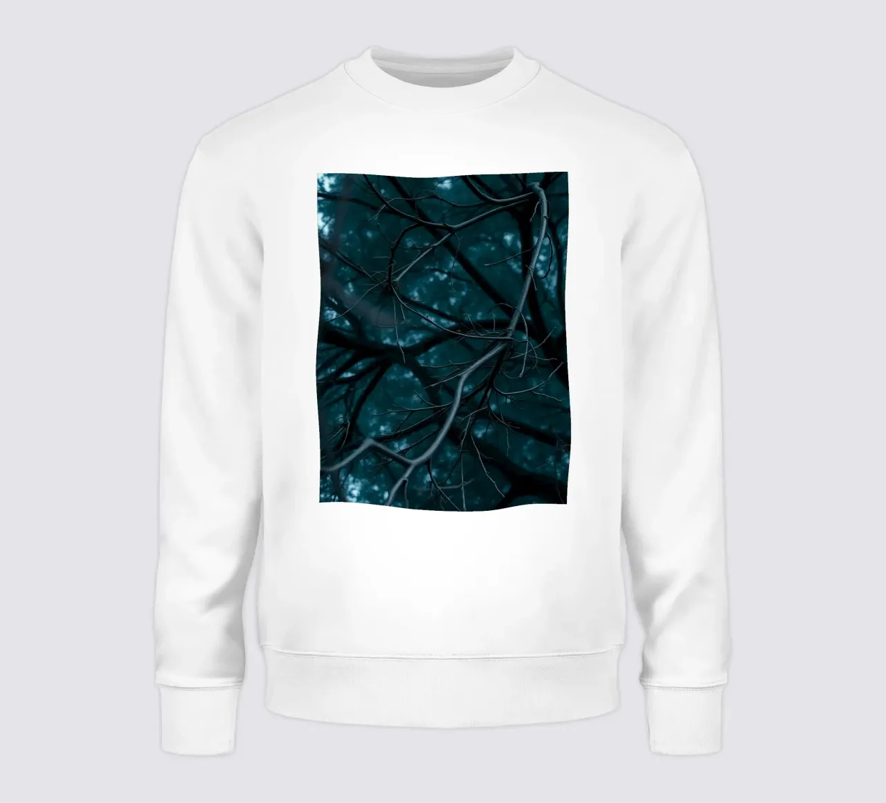 Branches intertwine against a dark, moody backdrop sweatshirt by DesignDoodle