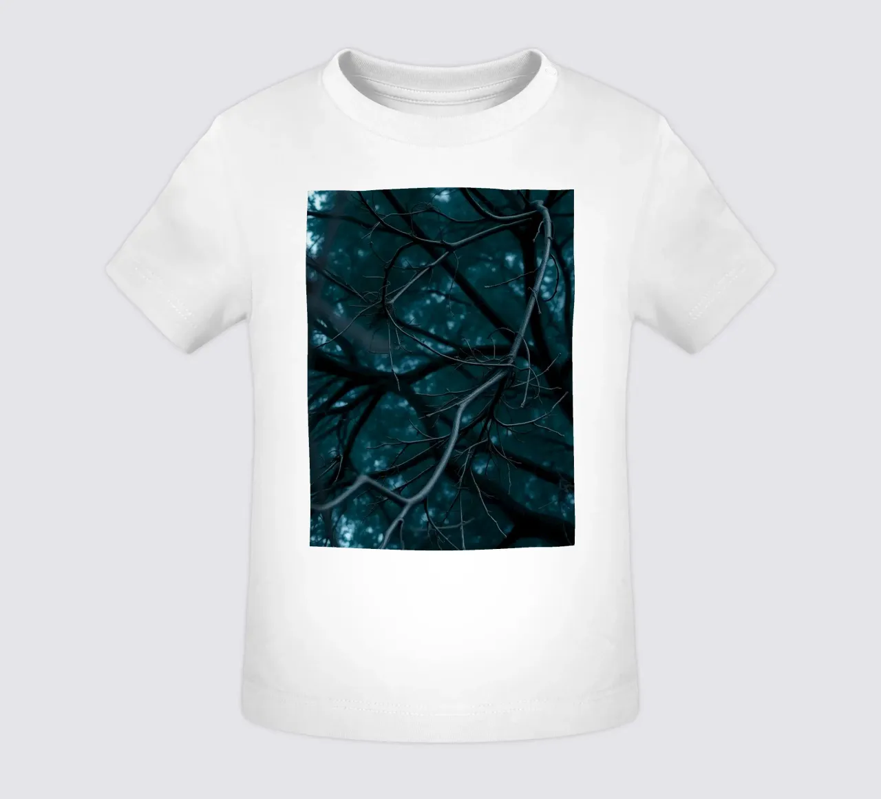Branches intertwine against a dark, moody backdrop baby t-shirt by DesignDoodle