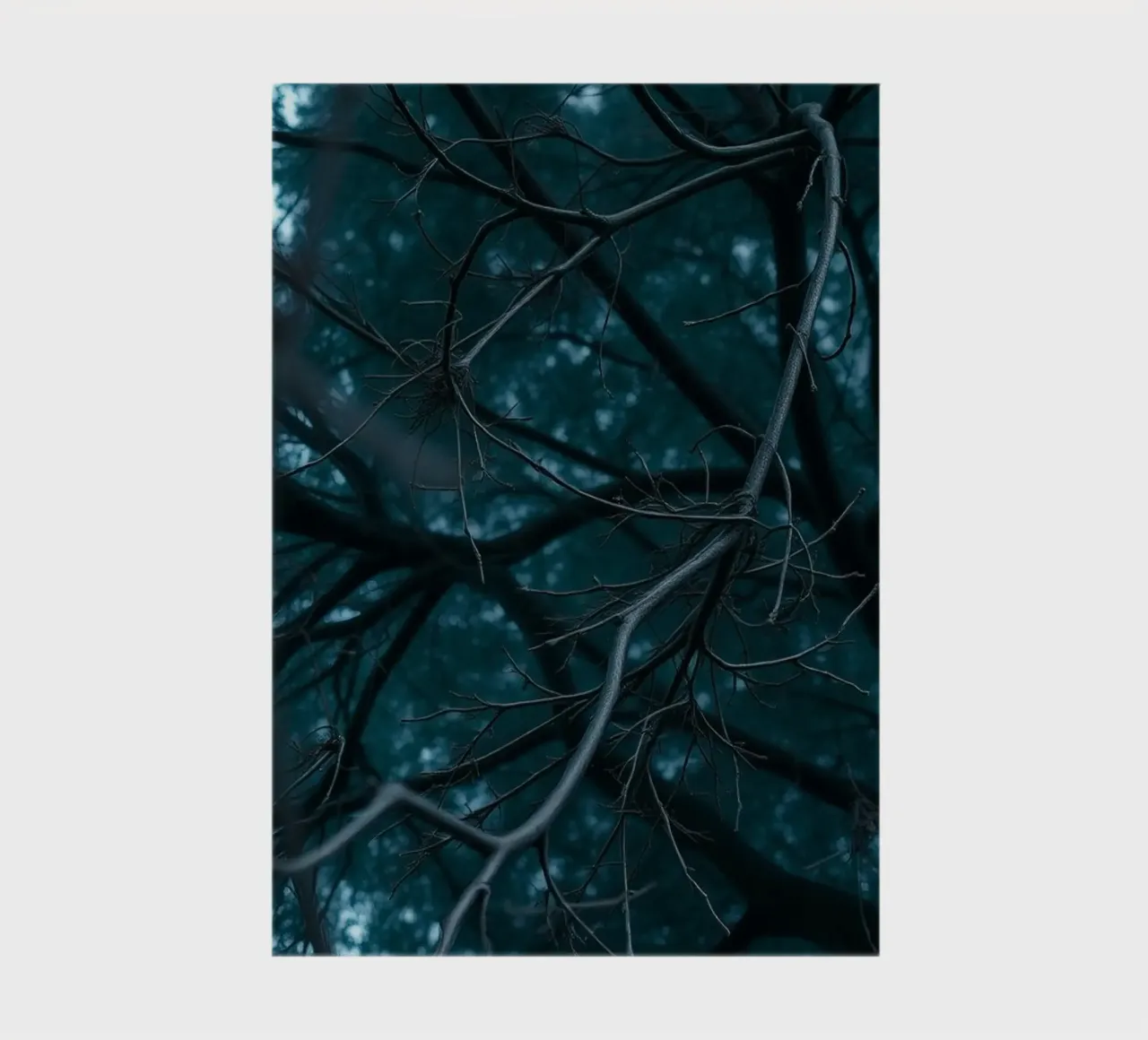 Branches intertwine against a dark, moody backdrop notebook by DesignDoodle