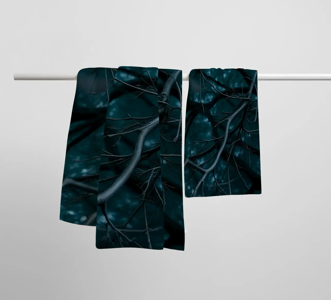 Branches intertwine against a dark, moody backdrop towel by DesignDoodle