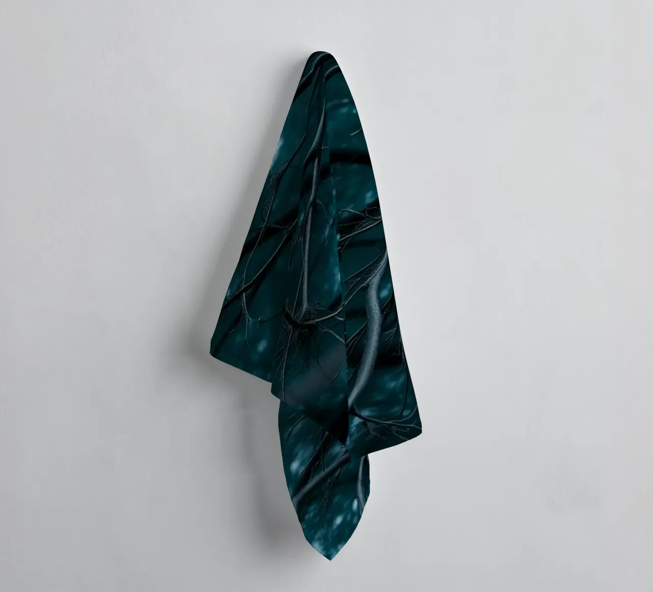 Branches intertwine against a dark, moody backdrop towel by DesignDoodle