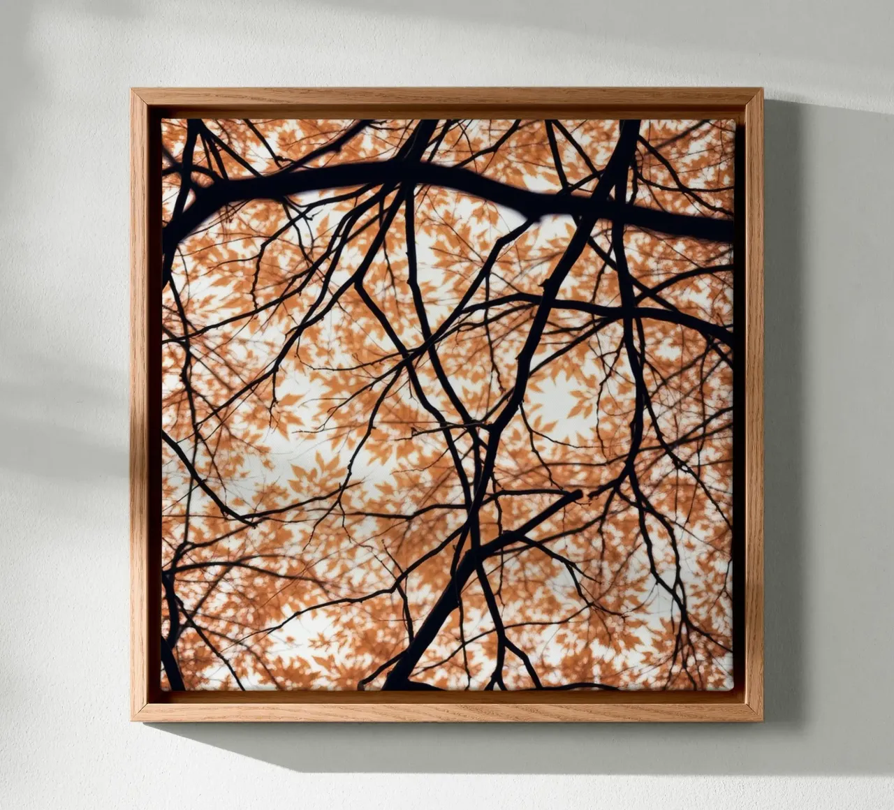 abstract beauty with orange leaves and intertwined branches canvas with Floater frame by DesignDoodle