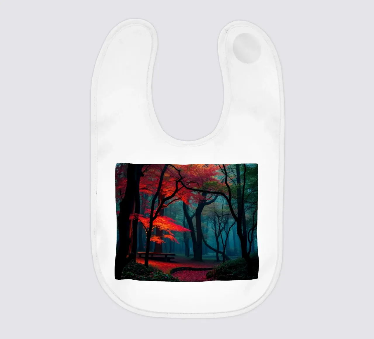 autumn foliage glows in a serene forest setting with misty baby bib by DesignDoodle