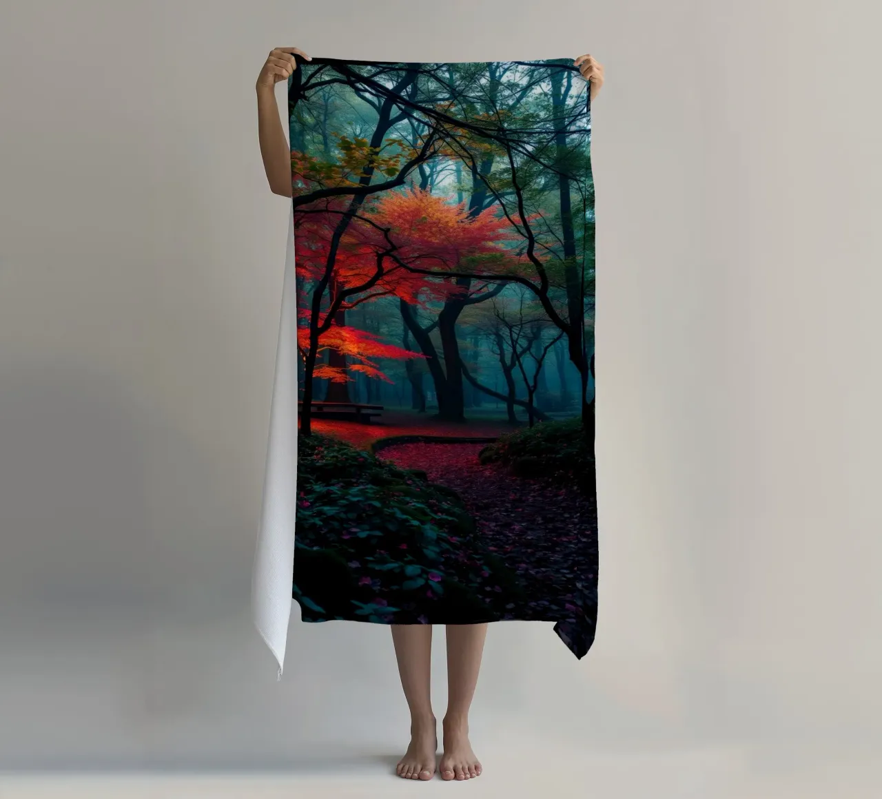 autumn foliage glows in a serene forest setting with misty beach towel by DesignDoodle
