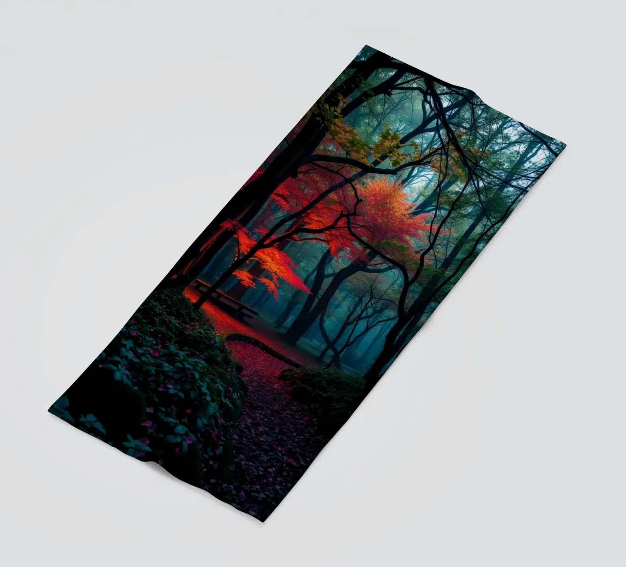 autumn foliage glows in a serene forest setting with misty beach towel by DesignDoodle