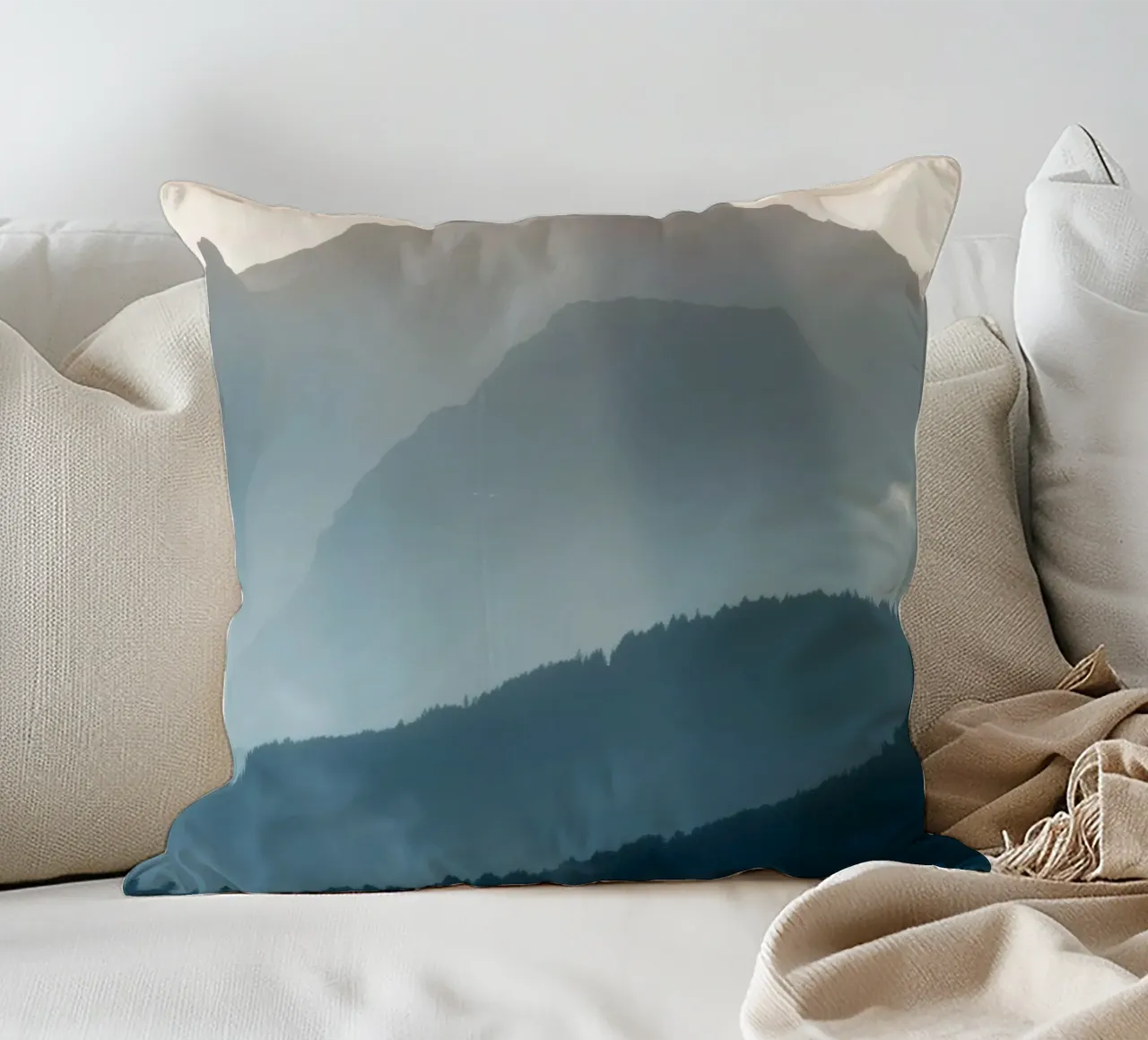 Beautiful mountain landscape with soft fog and gentle light decorative cushion by DesignDoodle