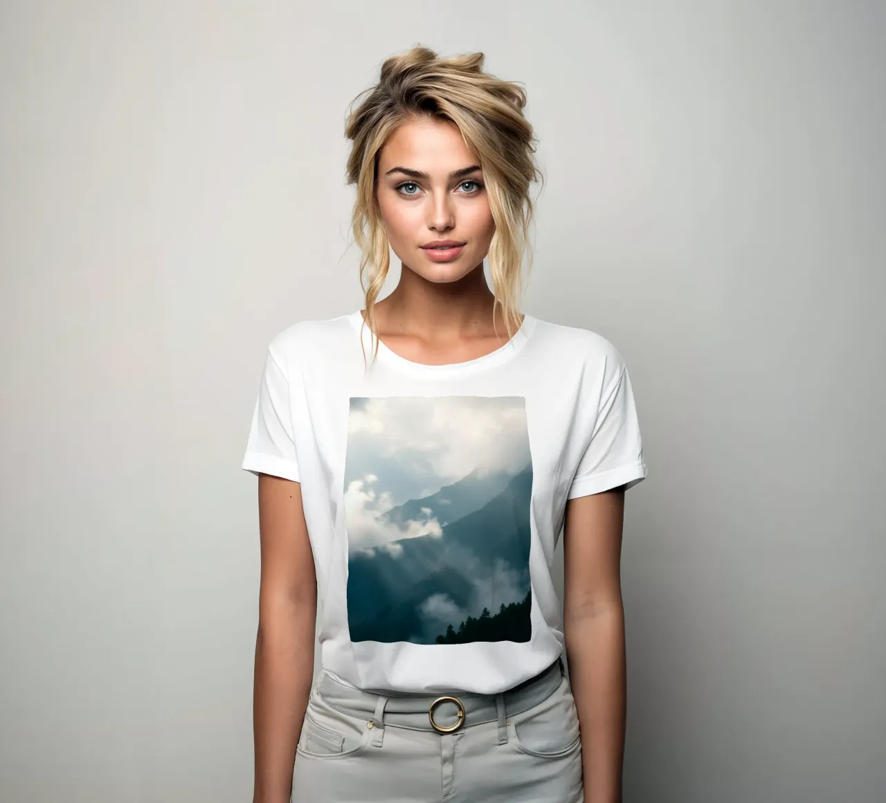 Mountain landscape with mist and clouds creating a serene women's fitted t-shirt by DesignDoodle