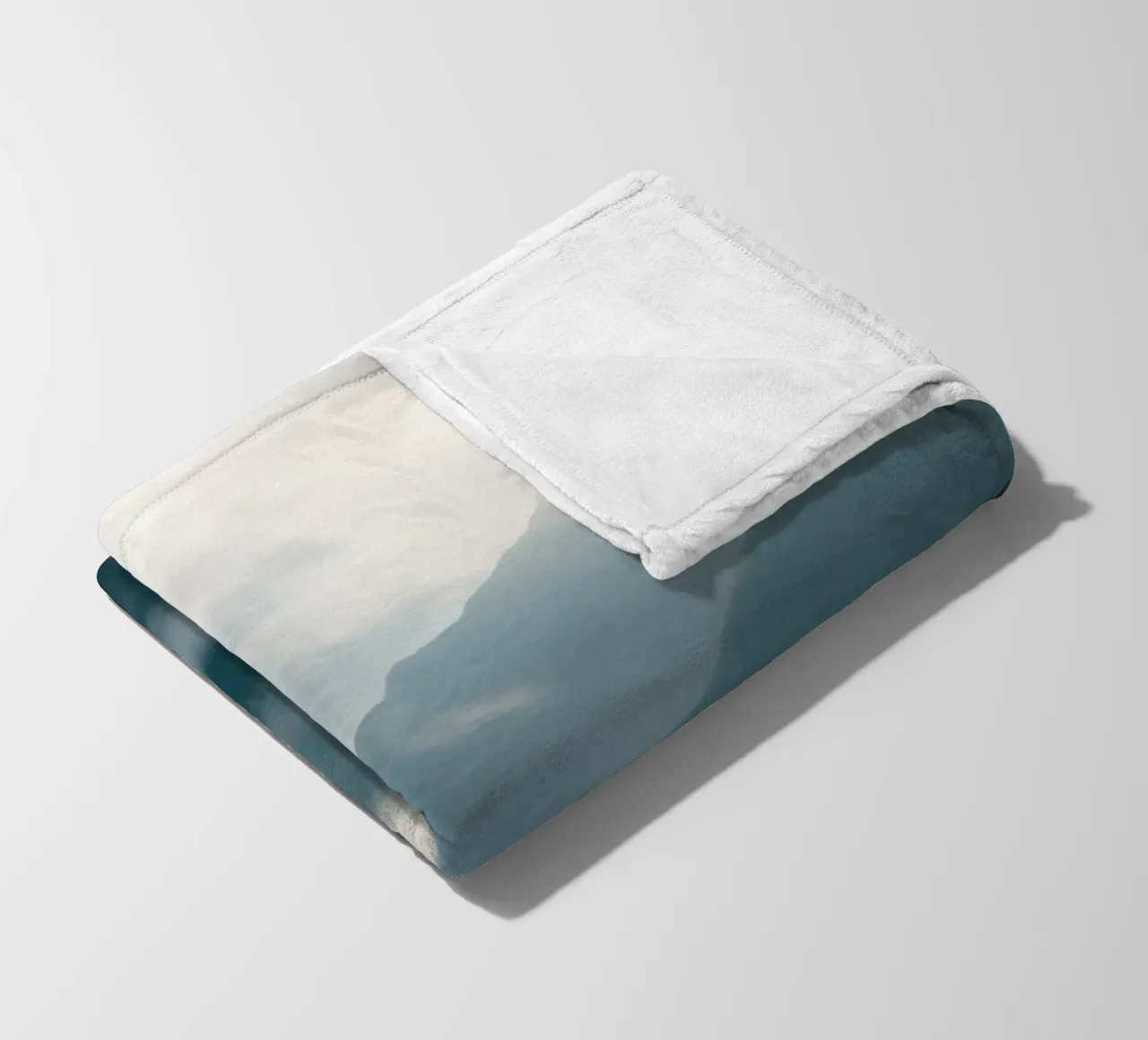 Mountain landscape with mist and clouds creating a serene fleece blanket by DesignDoodle