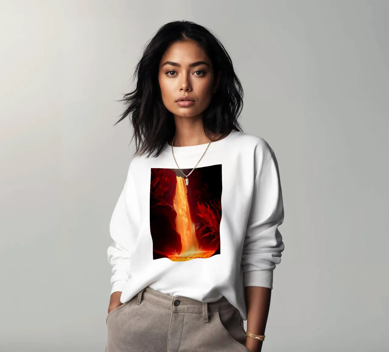 Mesmerizing lava waterfall illuminated by moonlight for stun sweatshirt by DesignDoodle