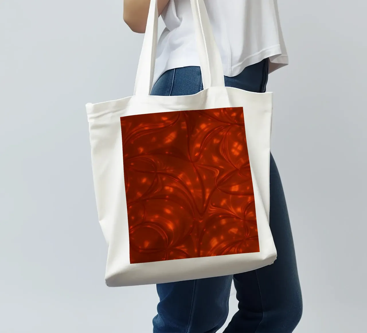 Vibrant abstract red pattern with luminous highlights tote bag by DesignDoodle