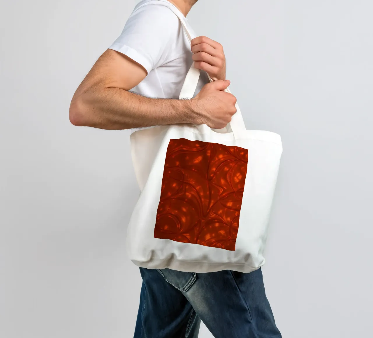 Vibrant abstract red pattern with luminous highlights tote bag by DesignDoodle