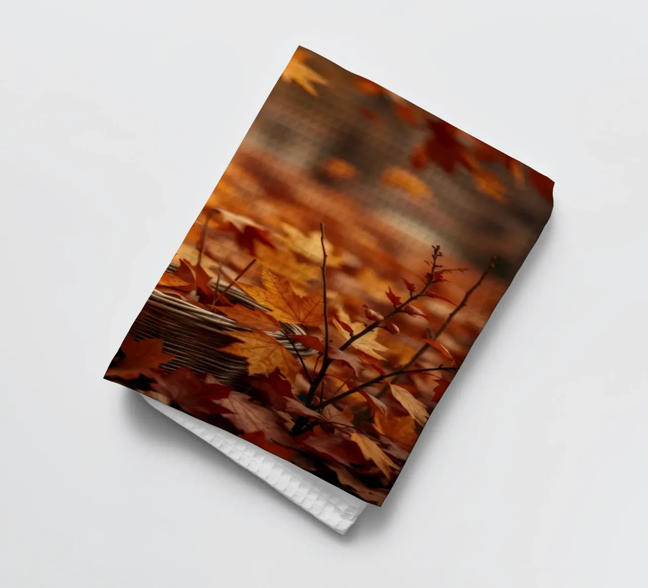 Calde foglie d'autunno sparse intorno a un cesto intrecciato canovaccio da cucina da DesignDoodle