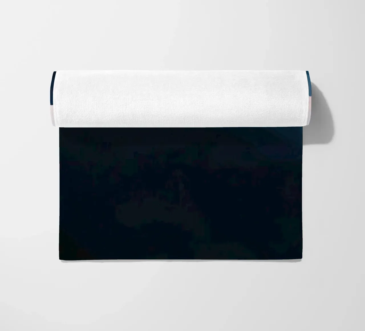 Serene mountain silhouettes at dusk create a tranquil feel beach towel by DesignDoodle