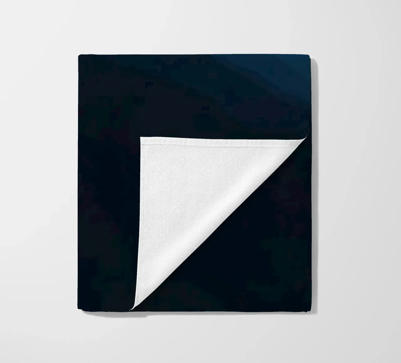 Serene mountain silhouettes at dusk create a tranquil feel beach towel by DesignDoodle