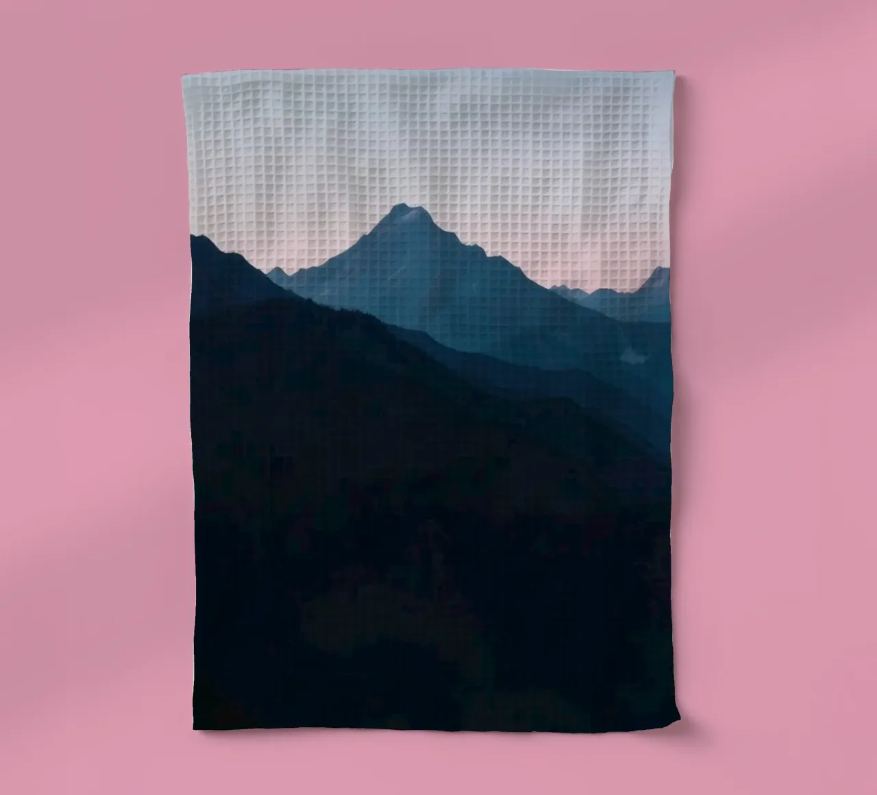 Serene mountain silhouettes at dusk create a tranquil feel tea towel by DesignDoodle