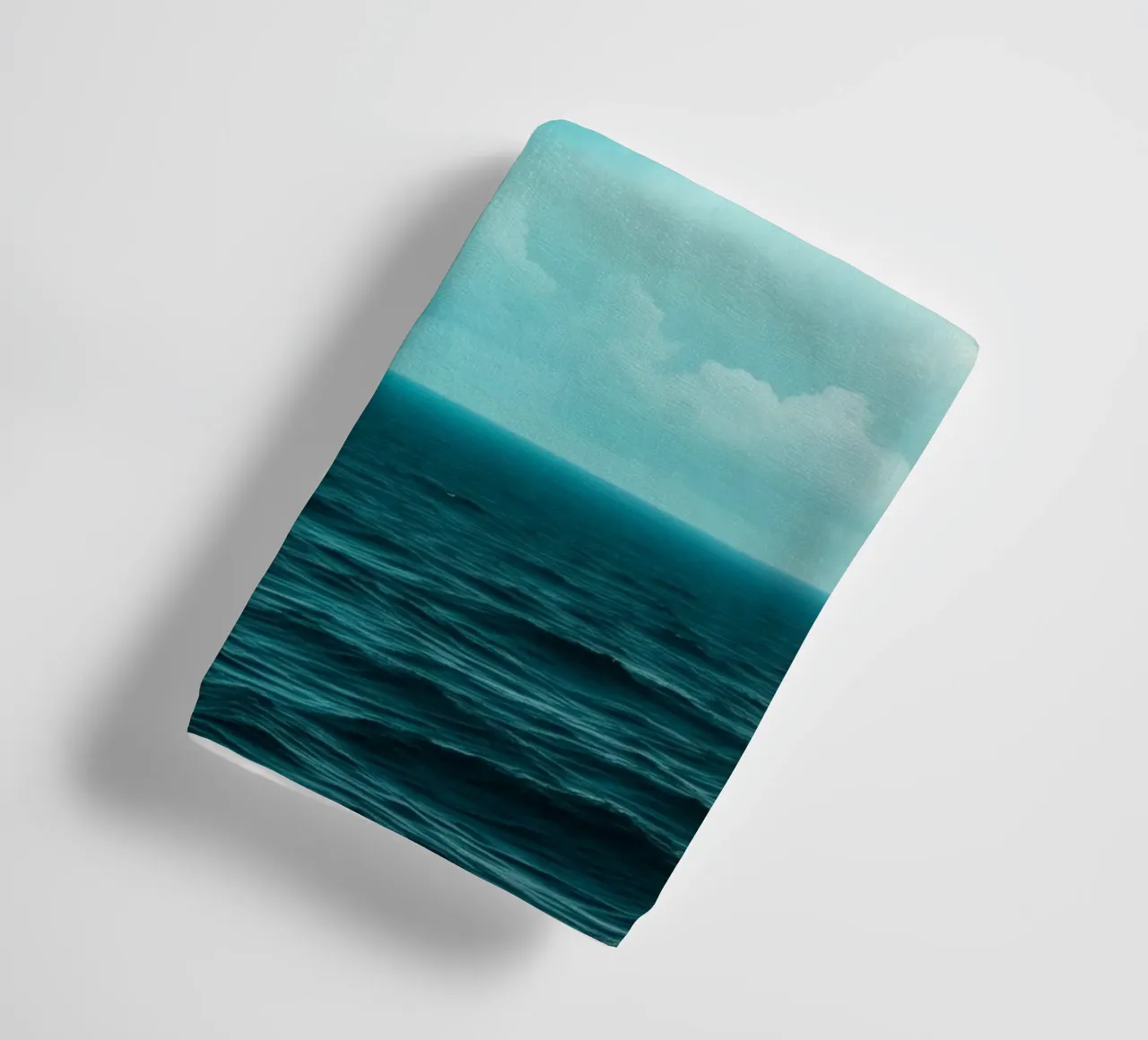 Dynamic sky over calm ocean creates serene backdrop for mobi towel by DesignDoodle