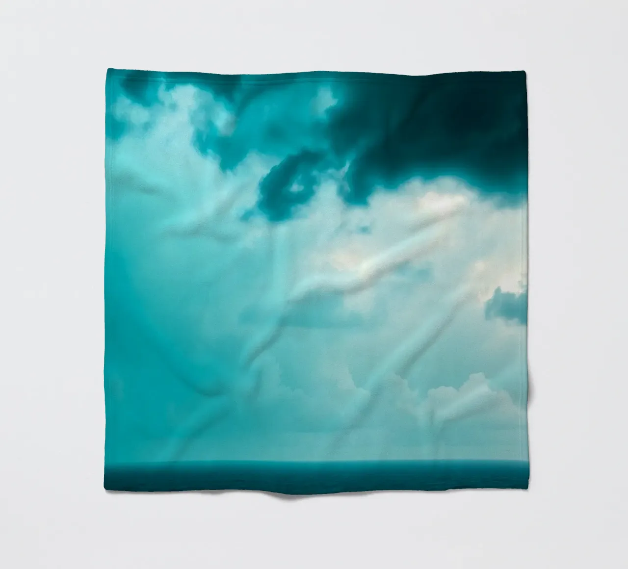 Dynamic sky over calm ocean creates serene backdrop for mobi fleece blanket by DesignDoodle