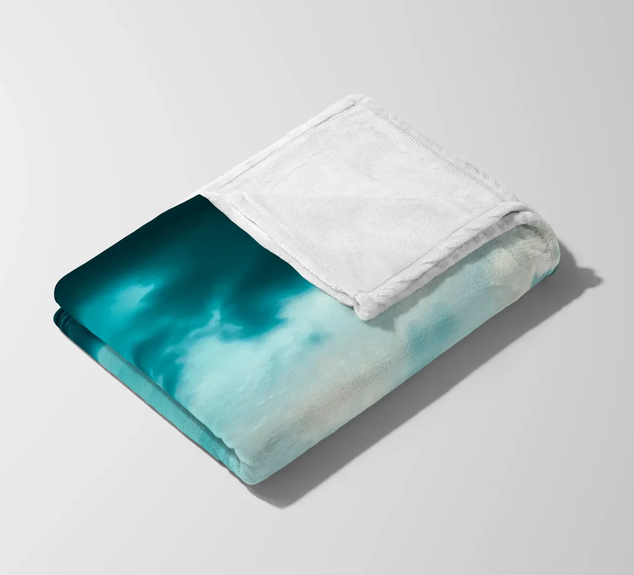 Dynamic sky over calm ocean creates serene backdrop for mobi fleece blanket by DesignDoodle