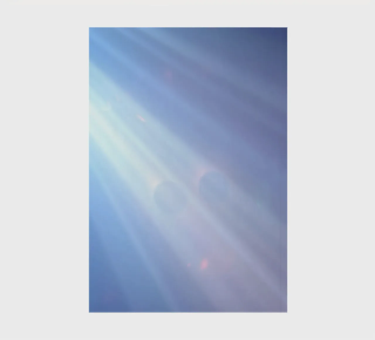 Soft blue light beams create a calming abstract background notebook by DesignDoodle