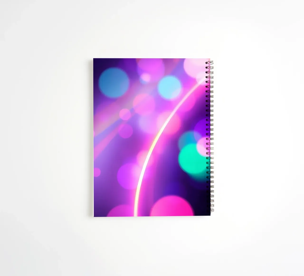 Vibrant abstract background with colorful circles blurred spiral notebook by DesignDoodle