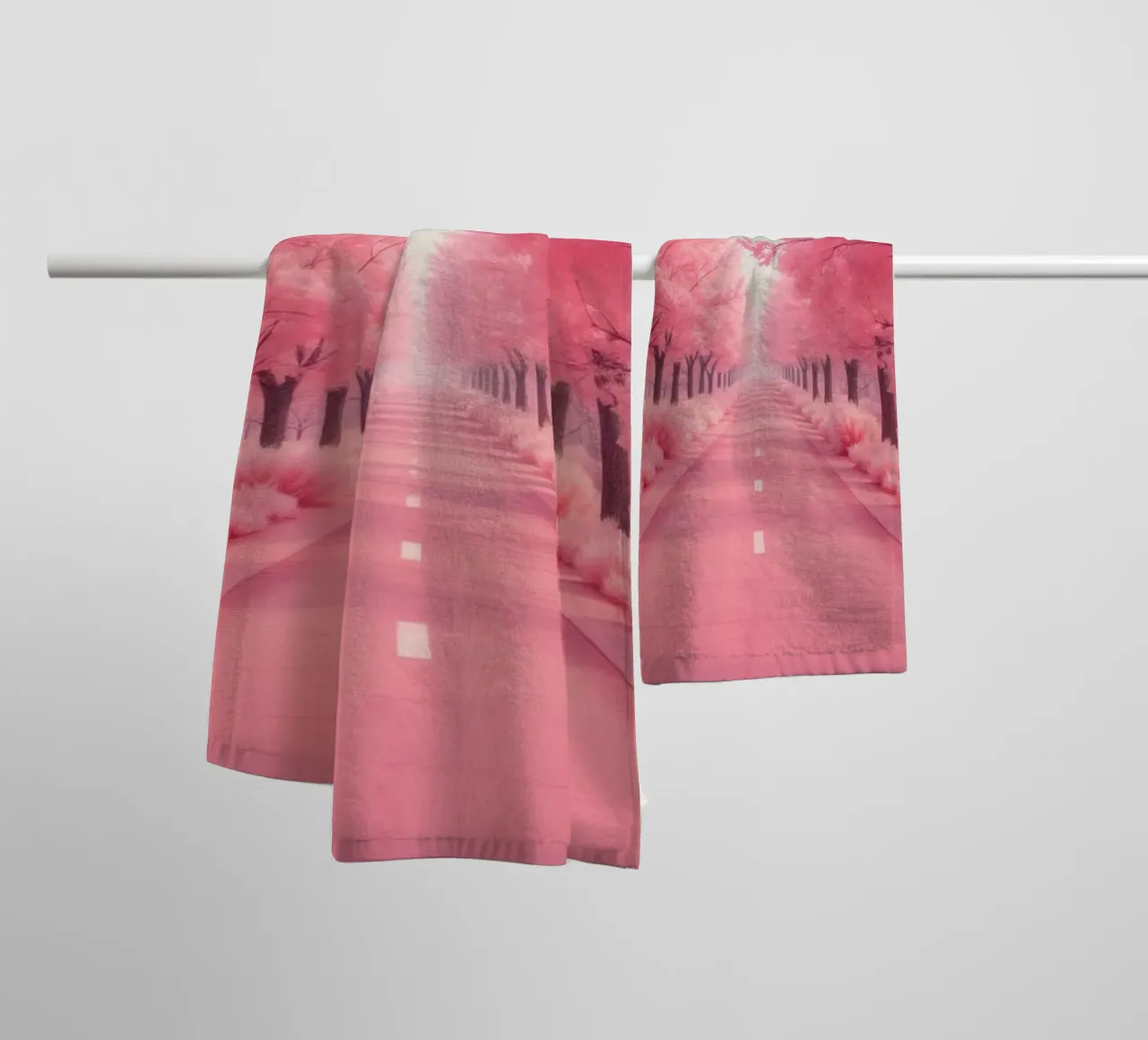 Alberi di ciliegio in fiore di colore rosa brillante costeggiano una strada serena sotto asciugamano da bagno da DesignDoodle
