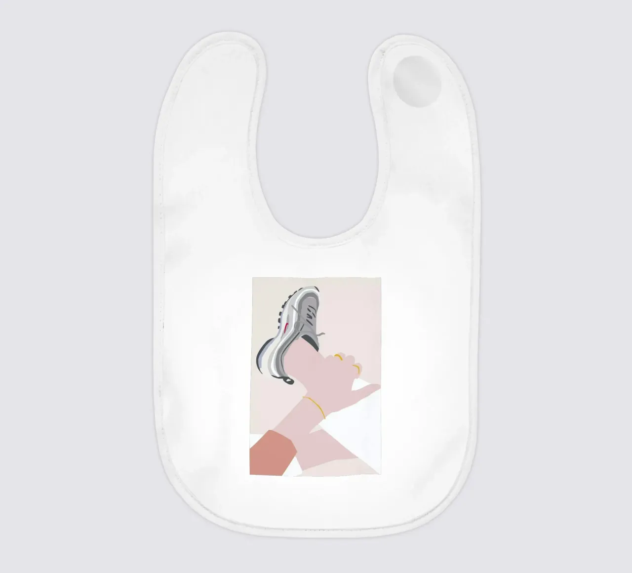 Sneaker baby bib by Helena Ravenne