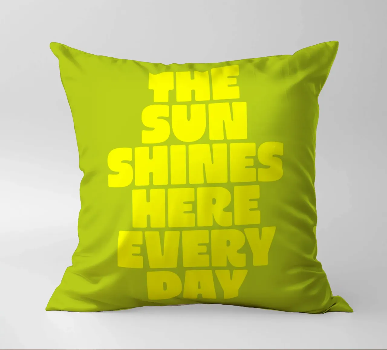 The Sun Shines Here Every Day Typography Print Yellow Green decorative cushion by THE MOTIVATED TYPE