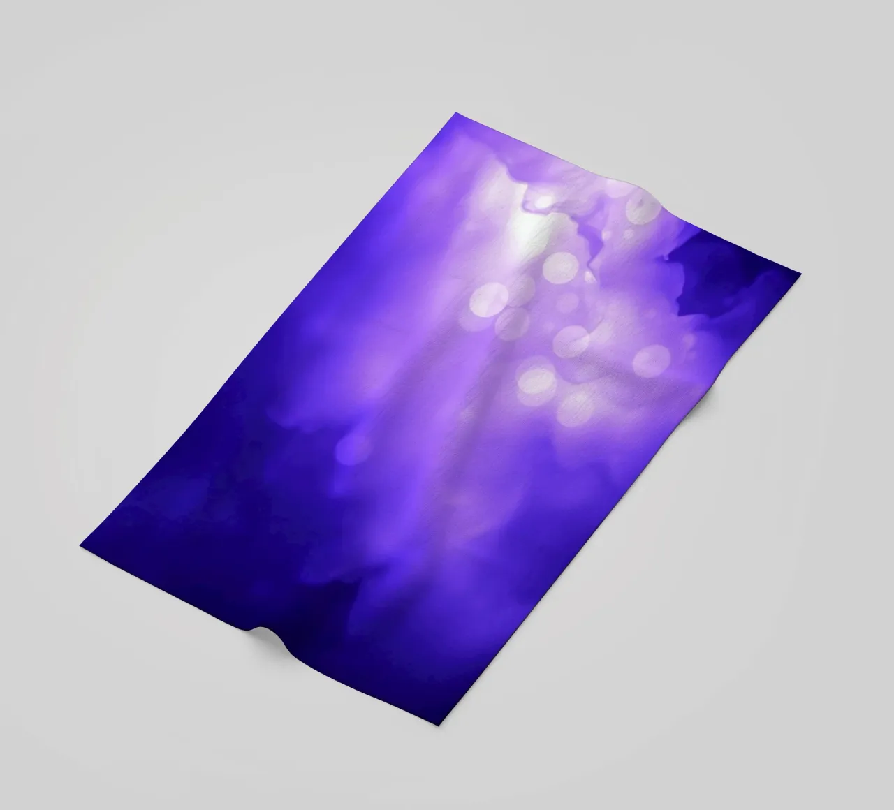 Abstract purple background with soft glowing dots beach towel by DesignDoodle
