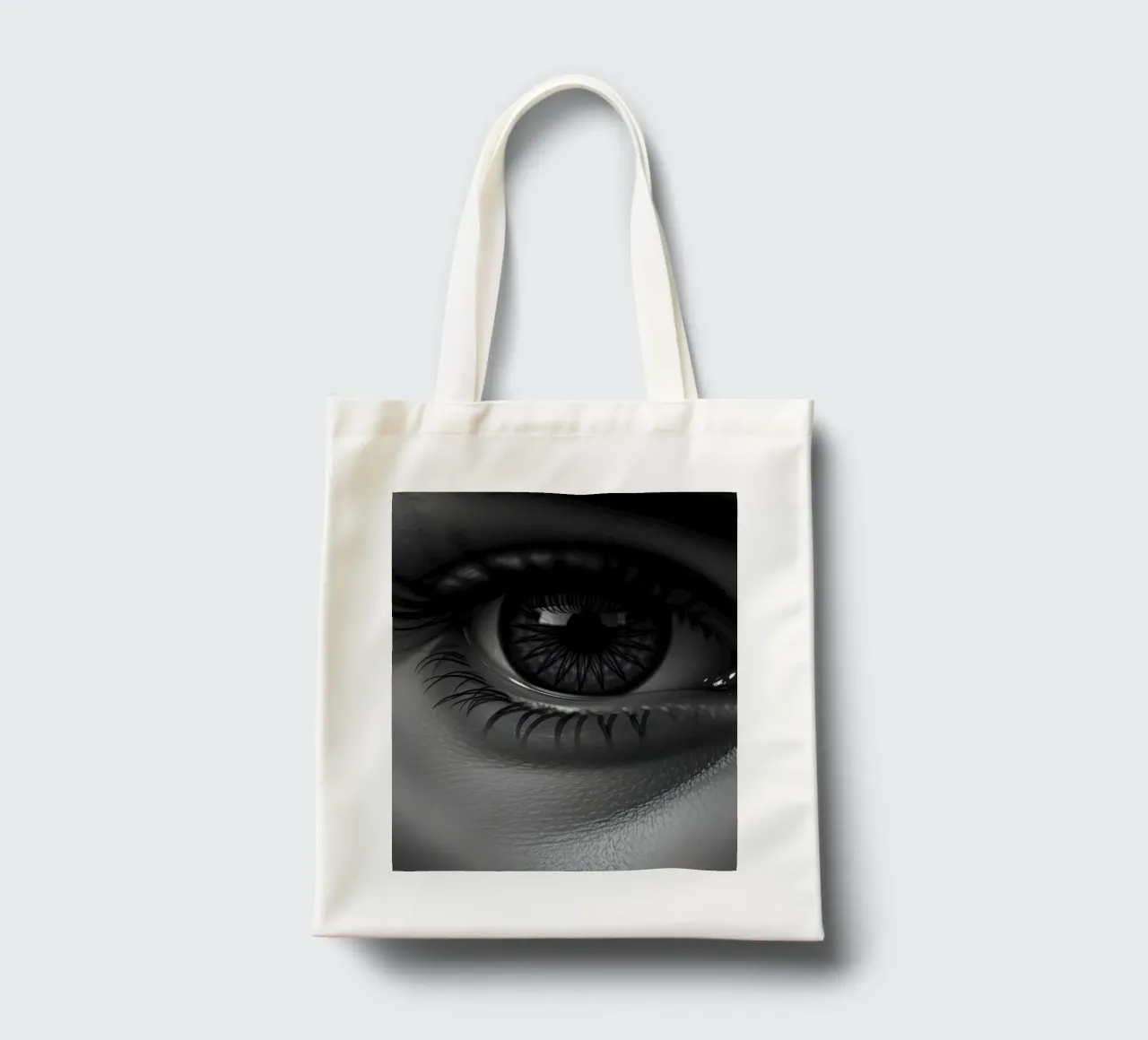 Gros plan sur un œil en noir et blanc avec des cils détaillés tote bag de DesignDoodle