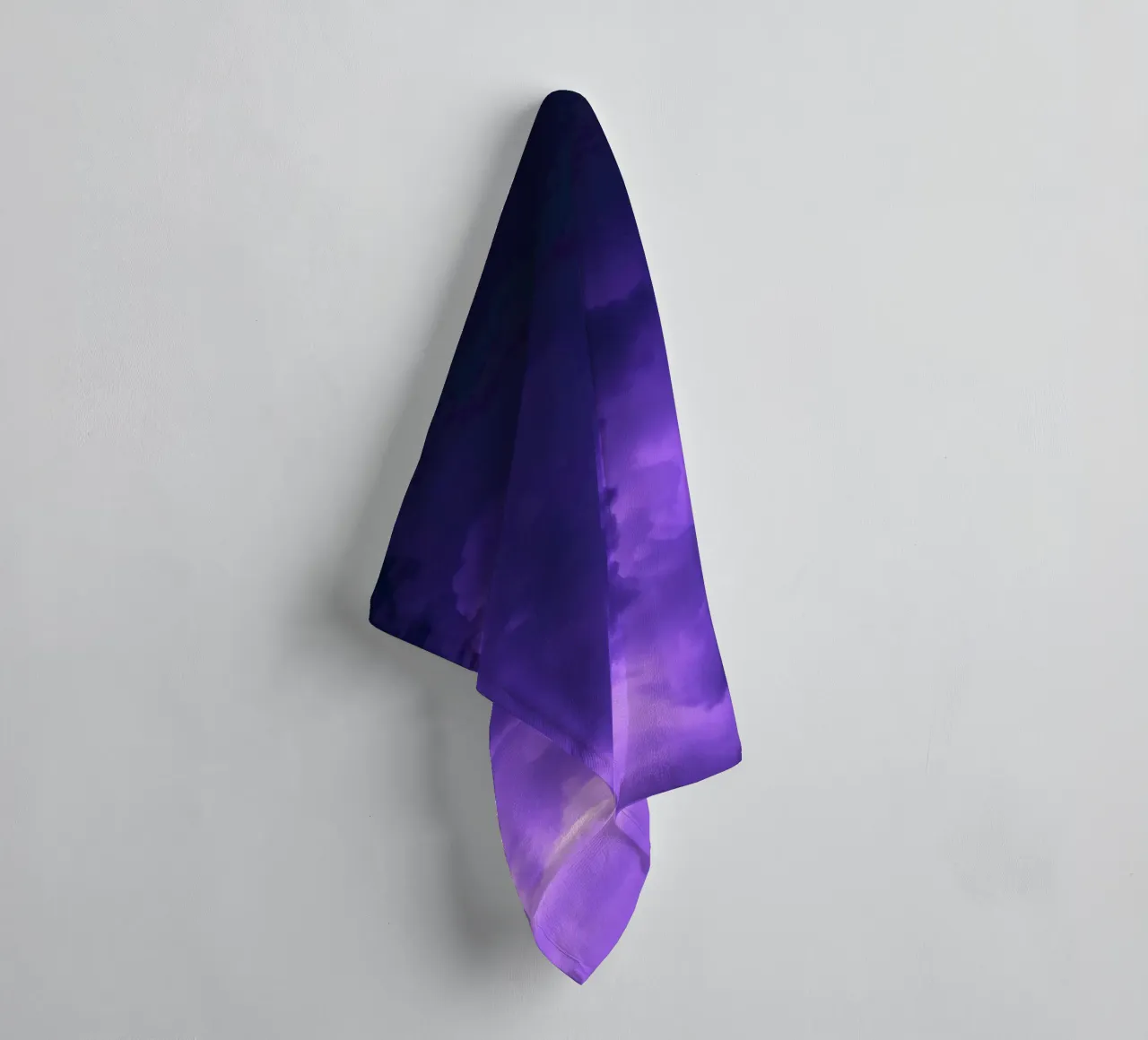 purple clouds filling the sky create a captivating art towel by DesignDoodle