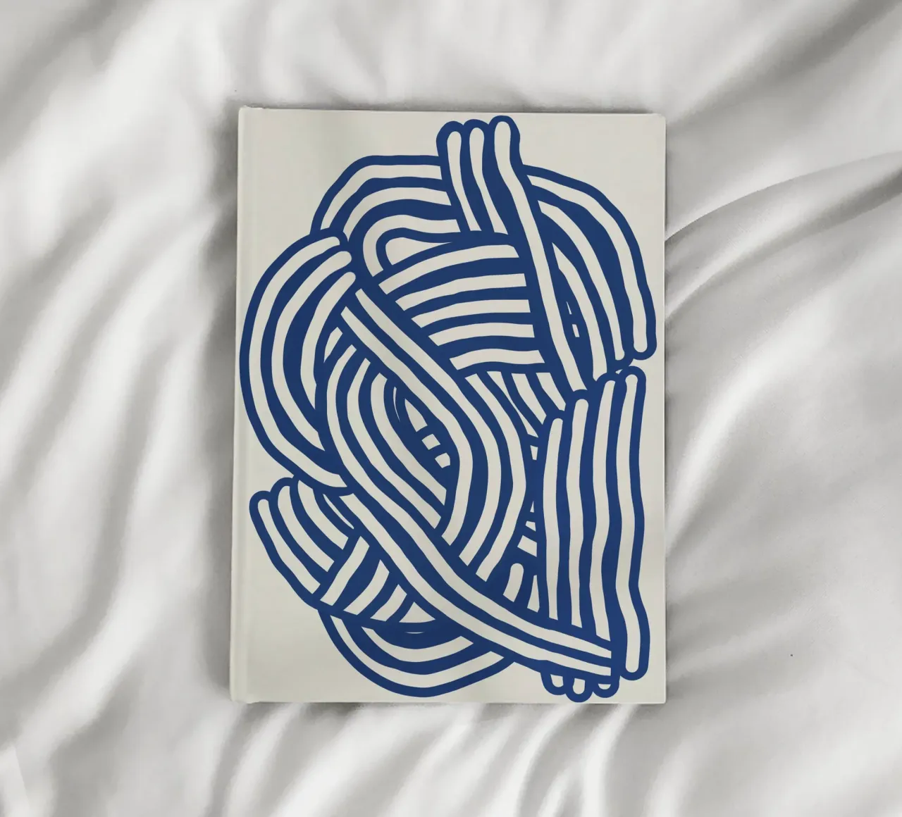 Line art organic shape in blue notebook by Little Dean