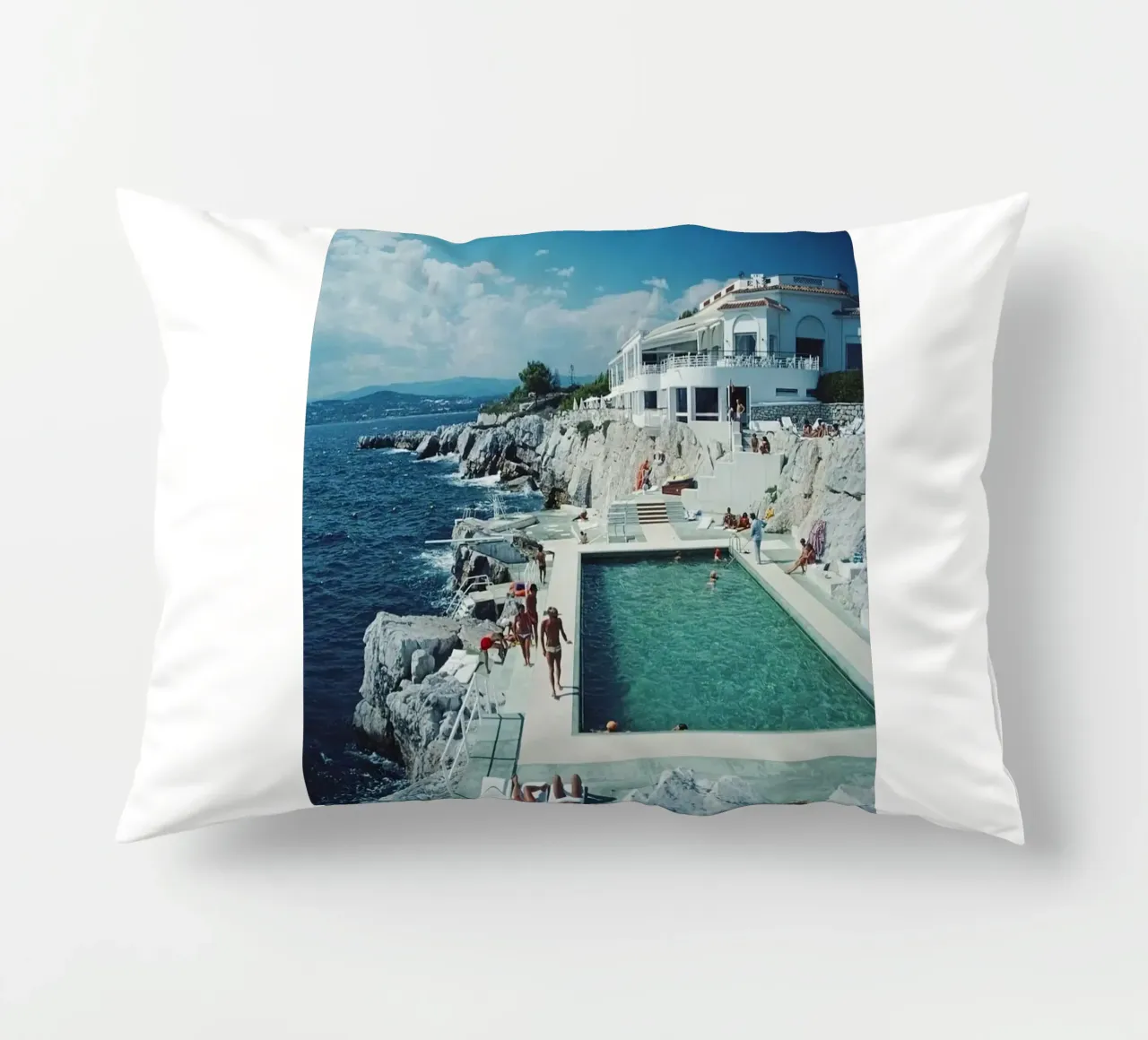 Sunbathing at the Beachside Pool Antibes, 1976 - Slim Aarons decorative cushion by The Poster UK