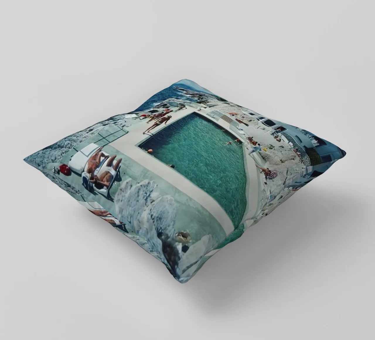 Sunbathing at the Beachside Pool Antibes, 1976 - Slim Aarons decorative cushion by The Poster UK