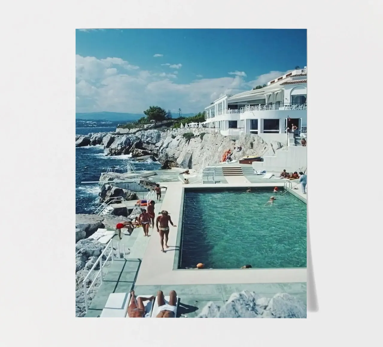 Sunbathing at the Beachside Pool Antibes, 1976 - Slim Aarons sticker sheet by The Poster UK
