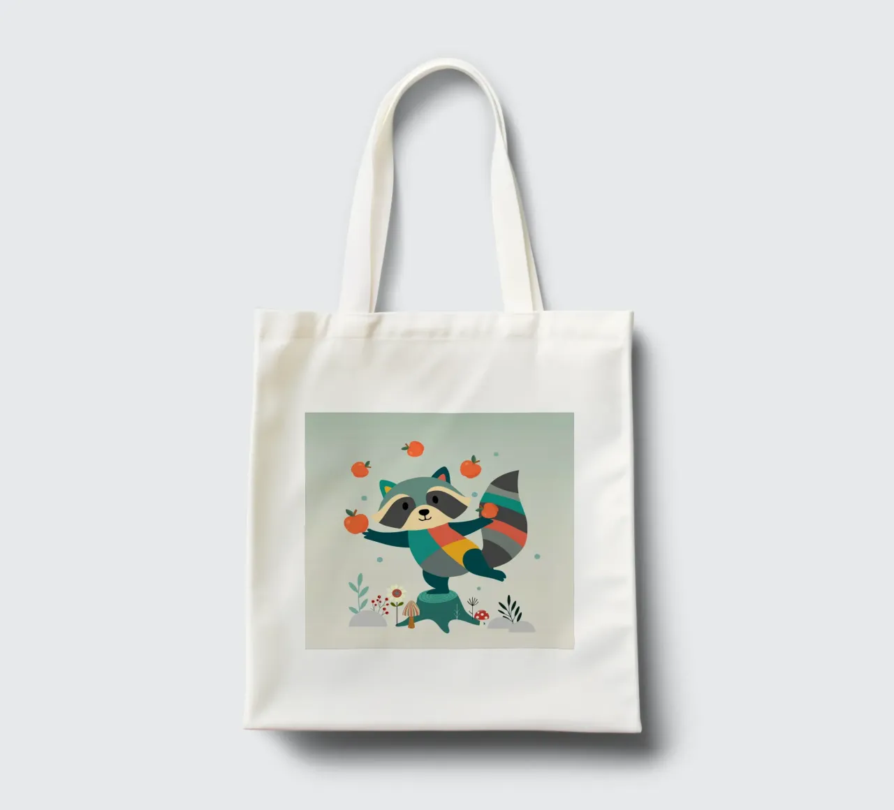Raccoon juggles happily with apples - Playful motif tote bag by namosh