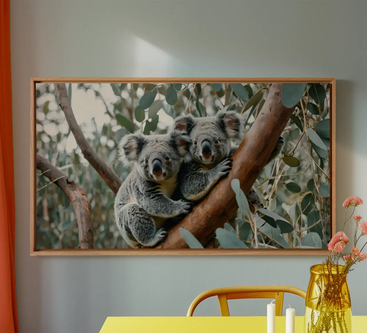 Two koalas resting together on a eucalyptus tree canvas by DesignDoodle