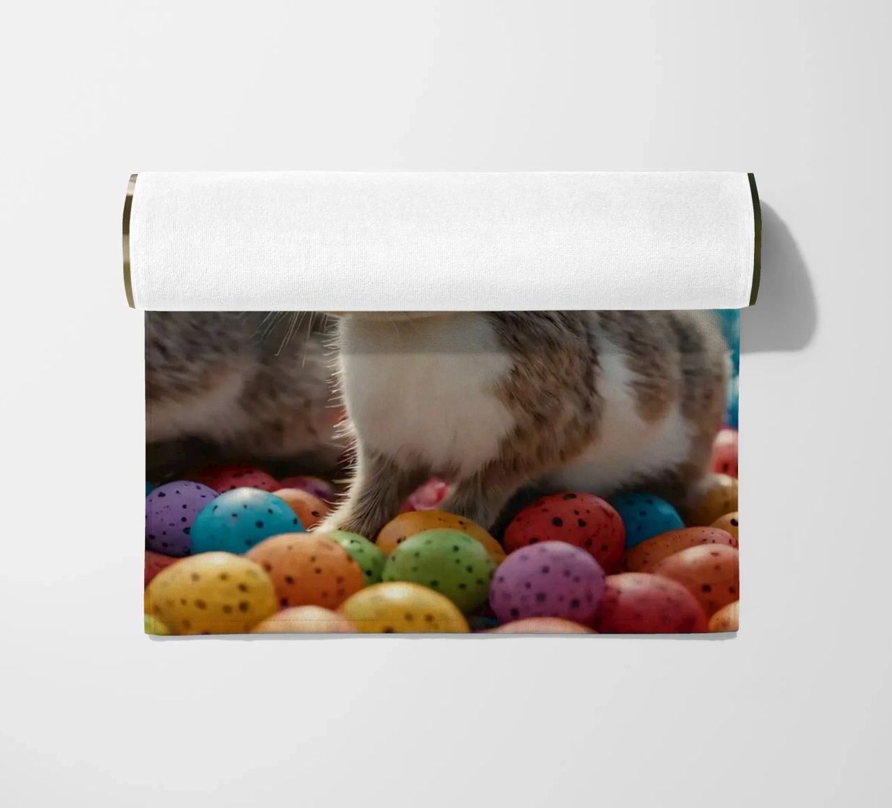 Rabbits exploring a colorful array of eggs beach towel by DesignDoodle
