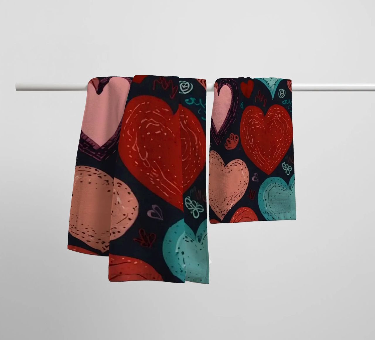Colorful heart patterns create a festive atmosphere towel by DesignDoodle