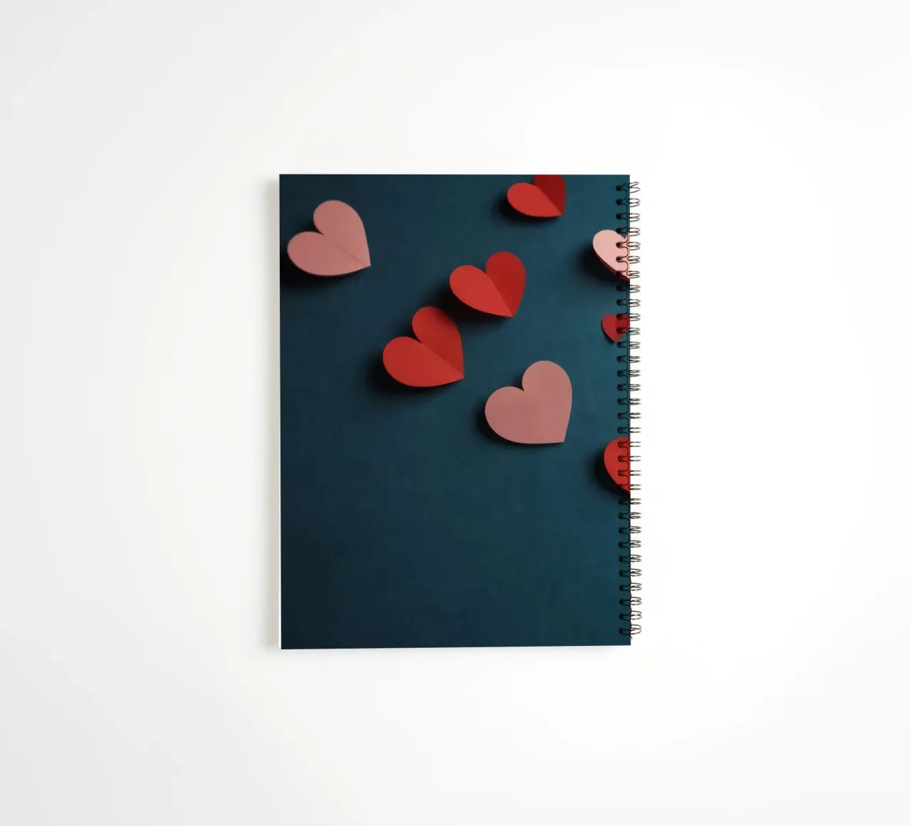 heart shapes and an envelope on a textured background spiral notebook by DesignDoodle