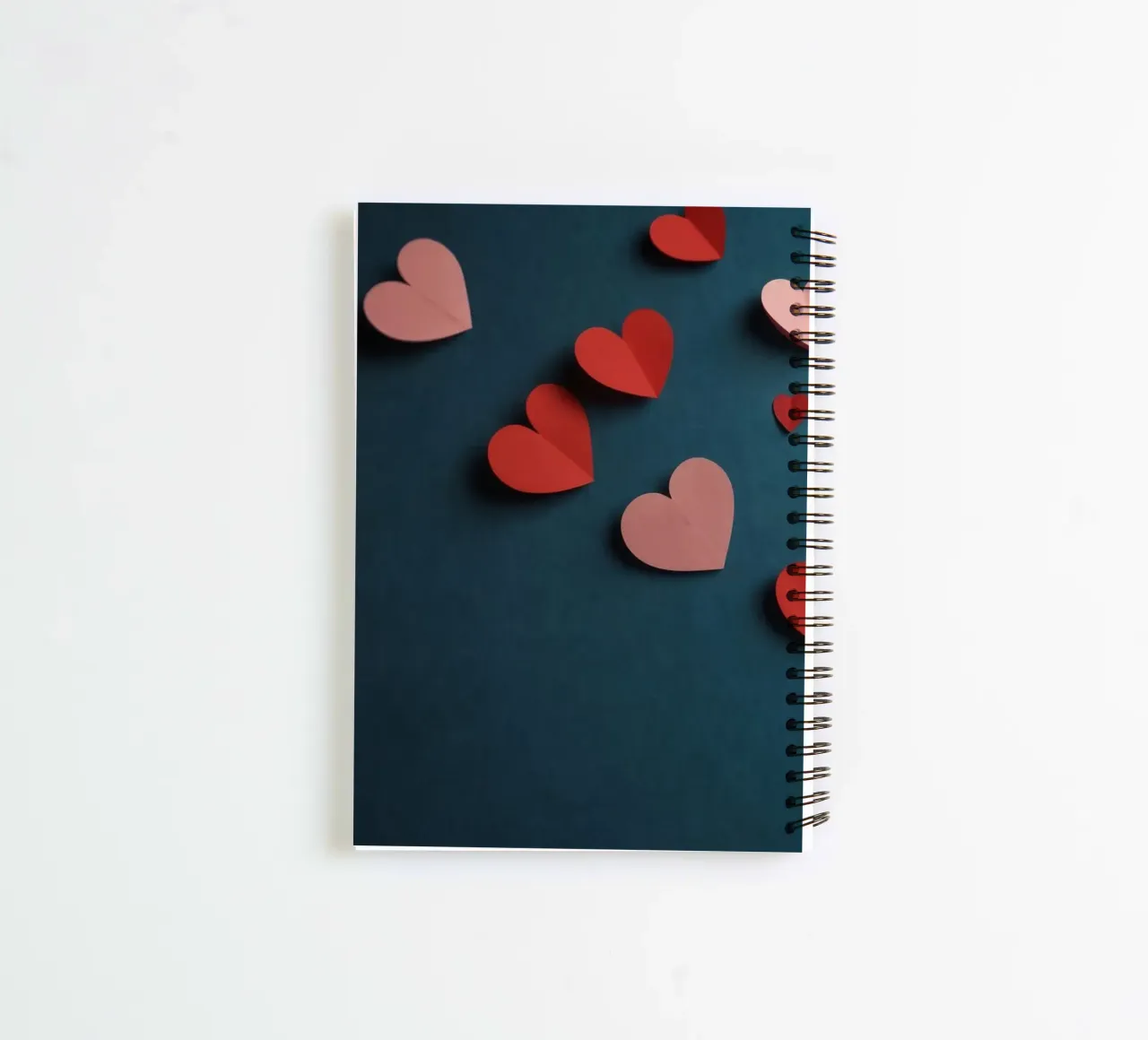 heart shapes and an envelope on a textured background spiral notebook by DesignDoodle